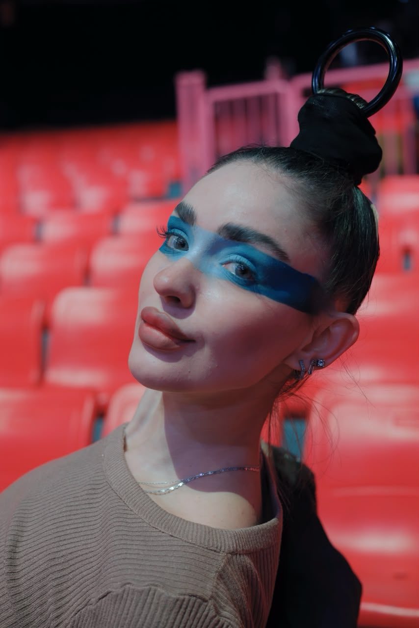 Milena Prudtskikh portrait with performance makeup in the arena